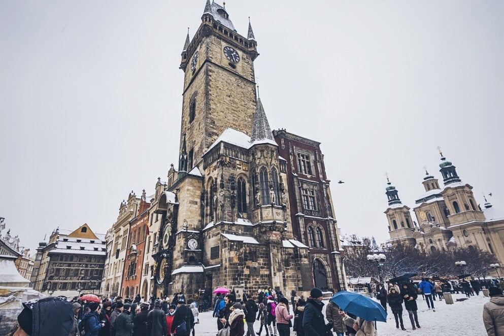 Snow in prague's Old Town Square, Astronomical clock in Prague