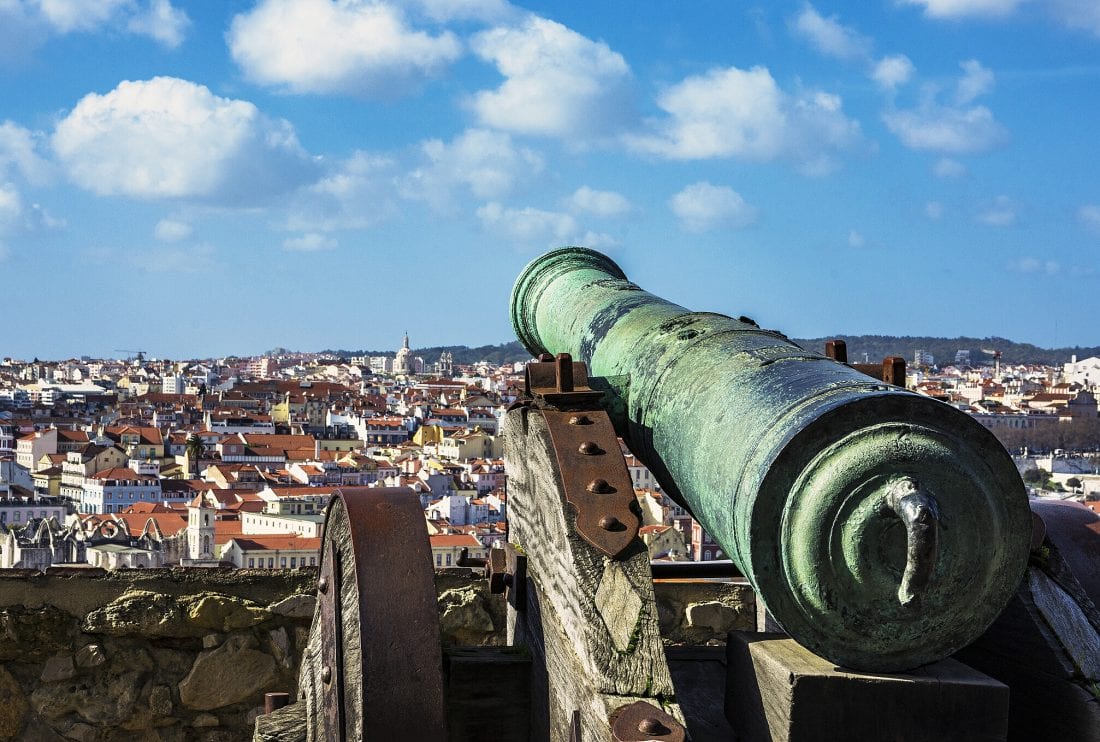 A old canon and the view from the Castelo de S. Jorge in Lisbon  