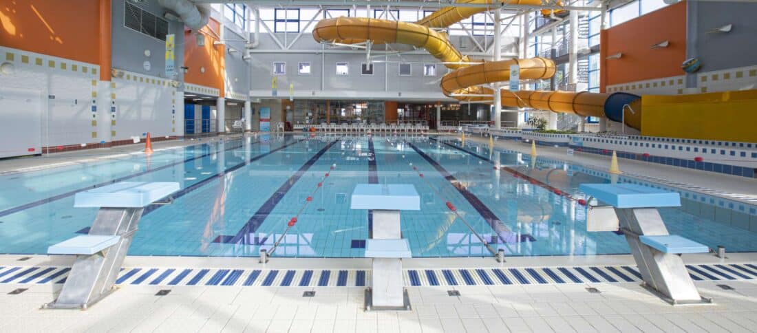 Large indoor swimming pool with water slides