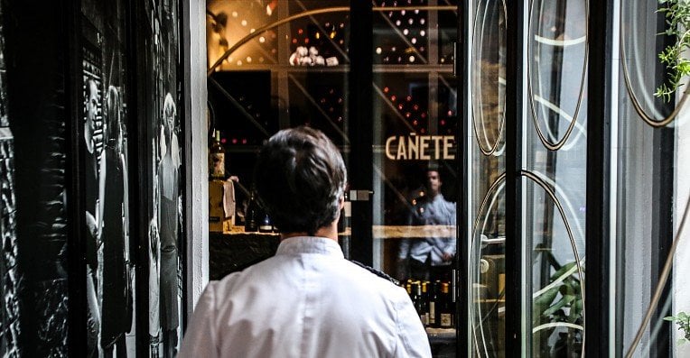 Waiter outside of a restaurant in Barcelona