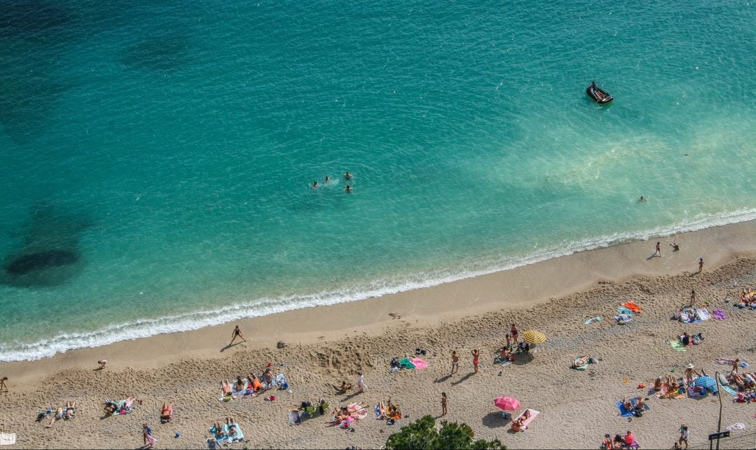 beach goers enjoying one of the best beaches in France