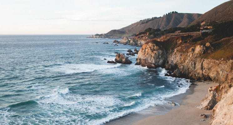 waves lapping against the coastline in Big Sur, California