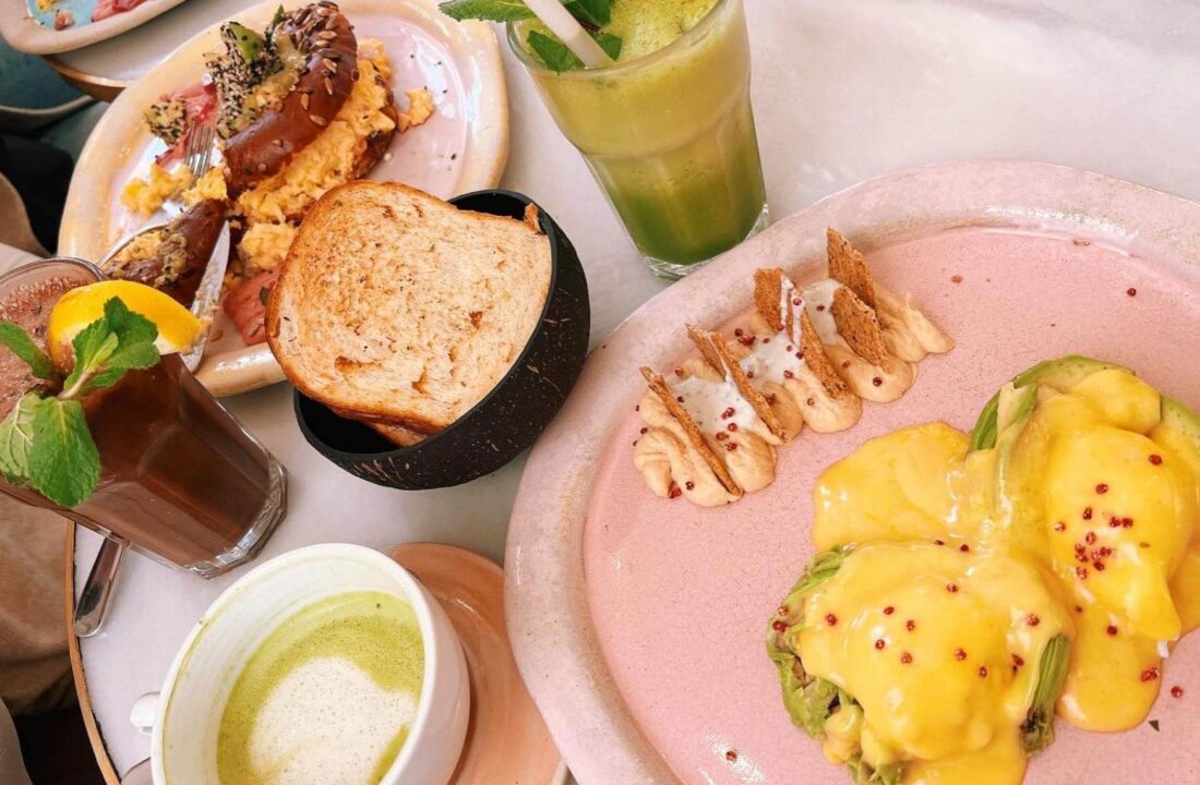 eggs, toast, and smoothies on plates