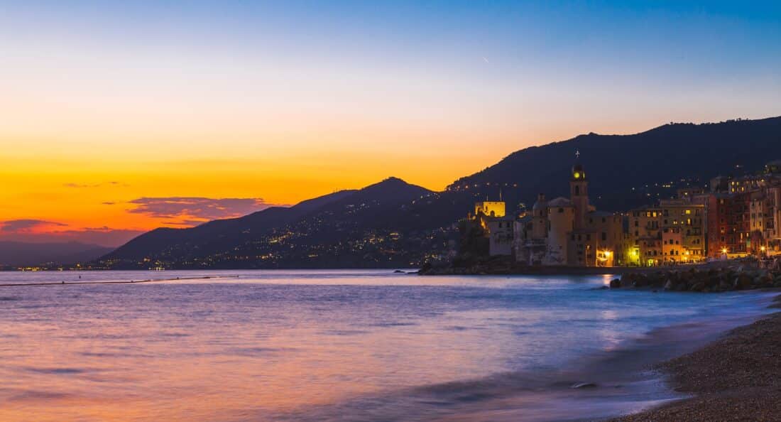 Sunset over the shoreline in Camogli, Italy.