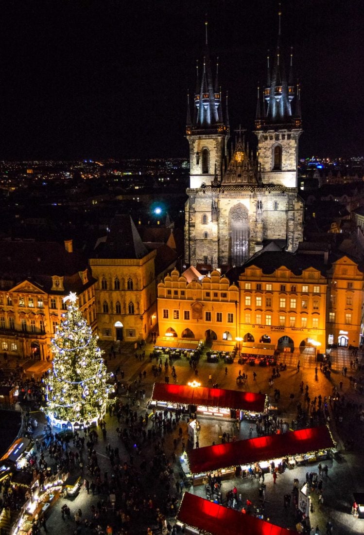 Prague Old Town Square Christmas market at night as seen from above