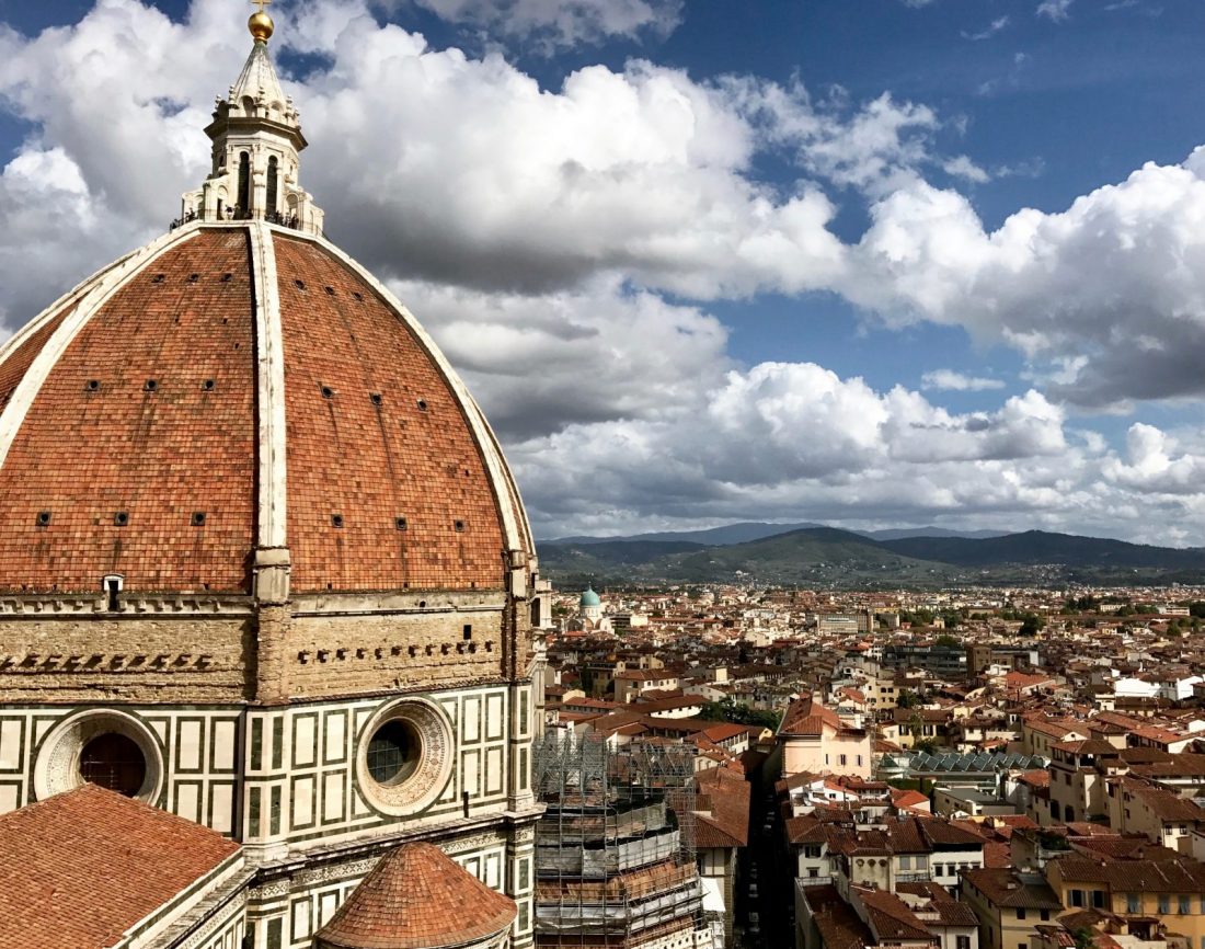 a view of a domed church in florence italy