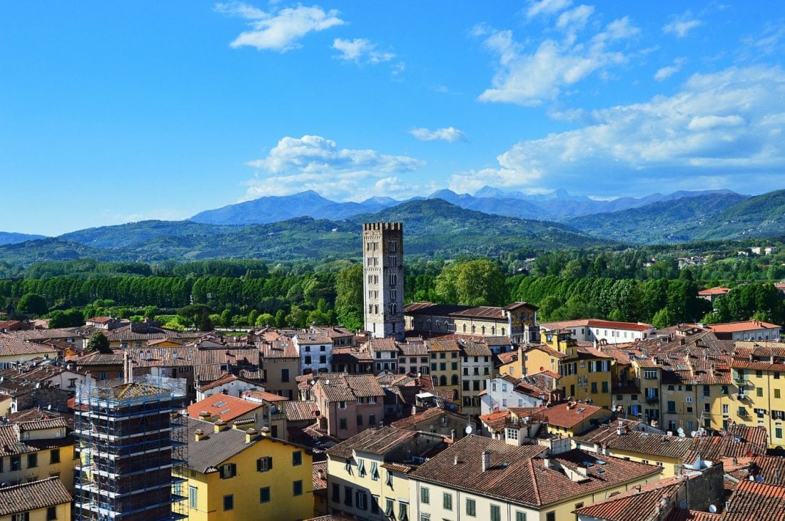 Rooftops and a church tower in Lucca, Italy.