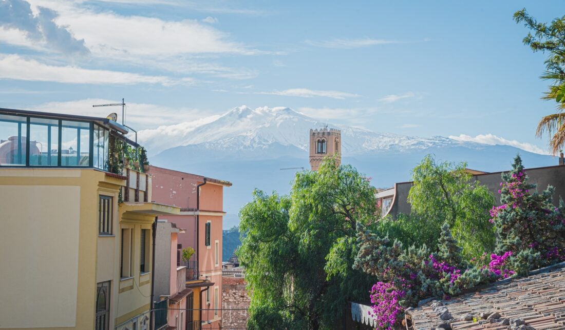 Mount Etna, a snow capped volcano in Sicily. 