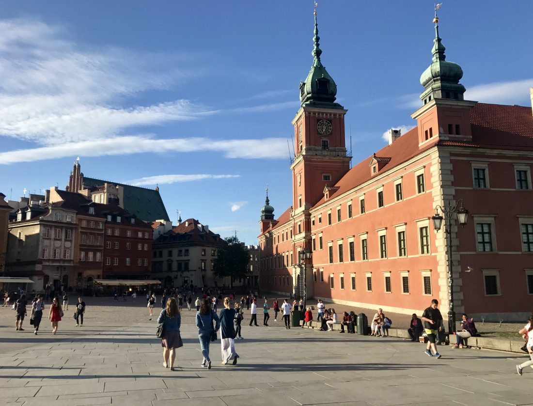 People walking through Old Town Square in Warsaw