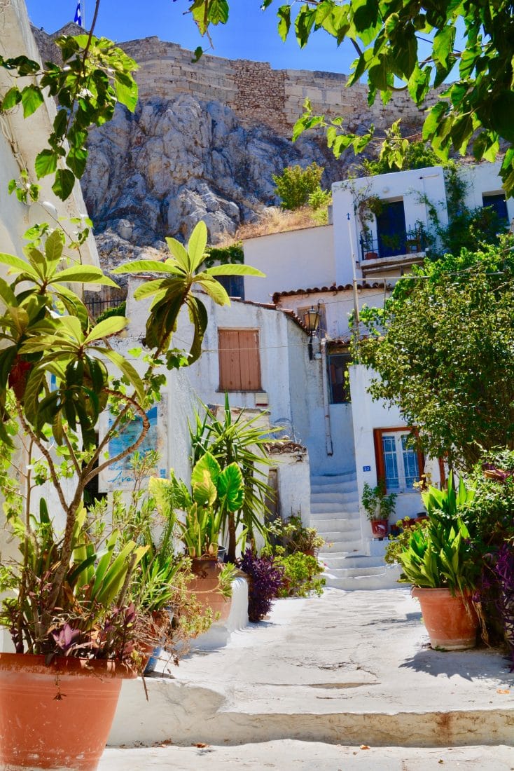 flower pots on a street in Plaka, Greece