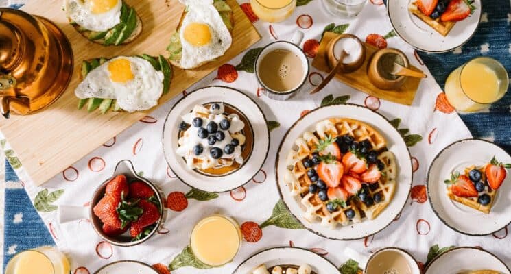 various breakfast and brunch dishes on plates