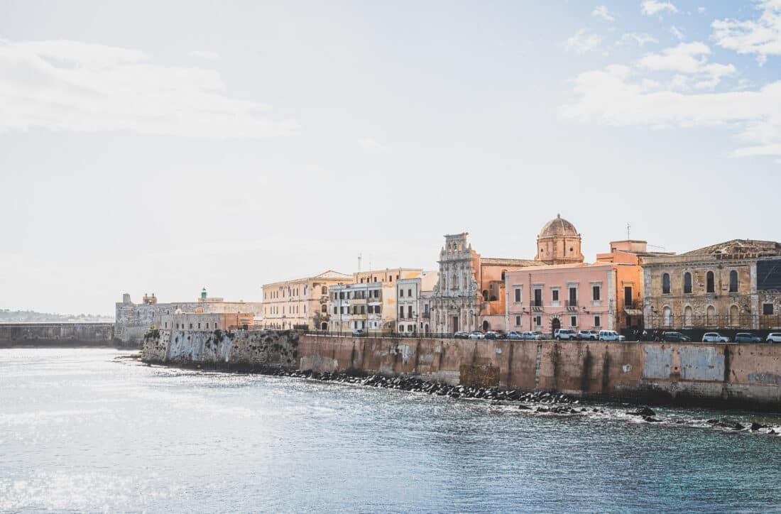 Buildings along the coast of Ortigia, Sicily, right before sunset.