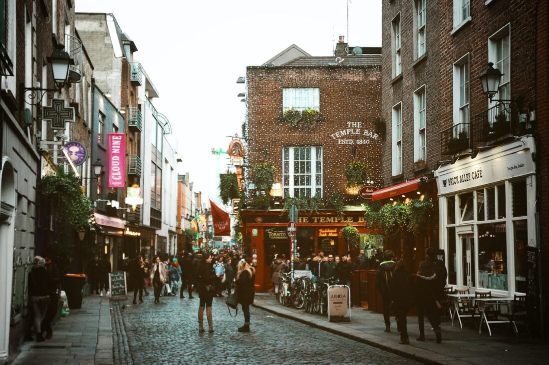 people on a street in dublin, ireland