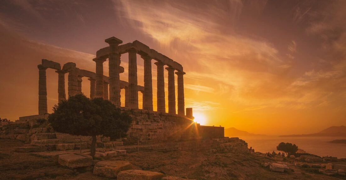 Sunset behind the Temple of Poseidon near Athens