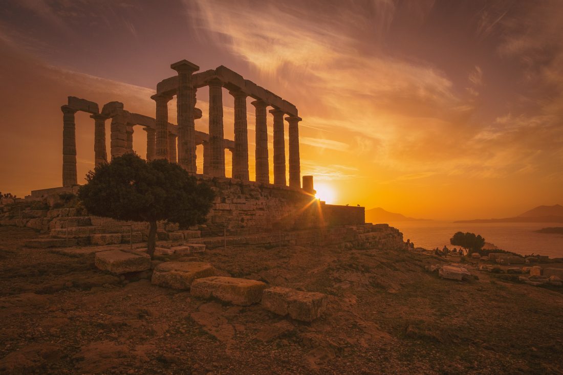 sunset and ancient ruins at a beach near Athens, Greece