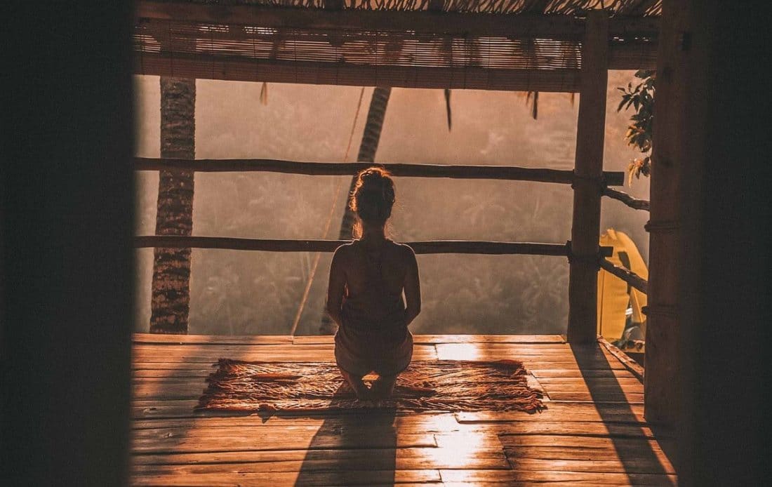 yoga and meditation during golden hour in bali tours indonesia
